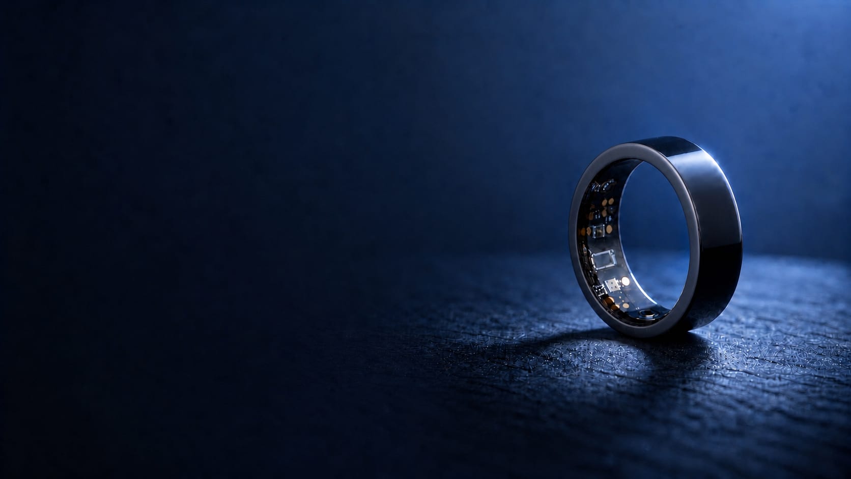 Midnight Black Fitmo Ring showing its inner electronics